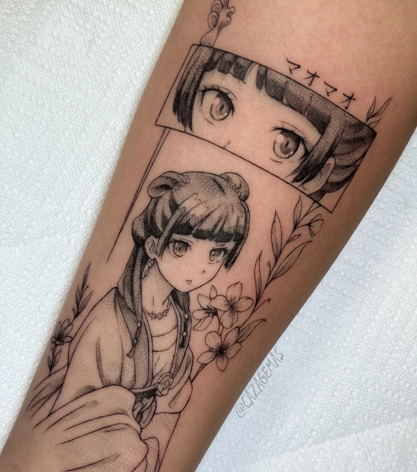 Tattoo of an anime girl with an eyes panel and flowers