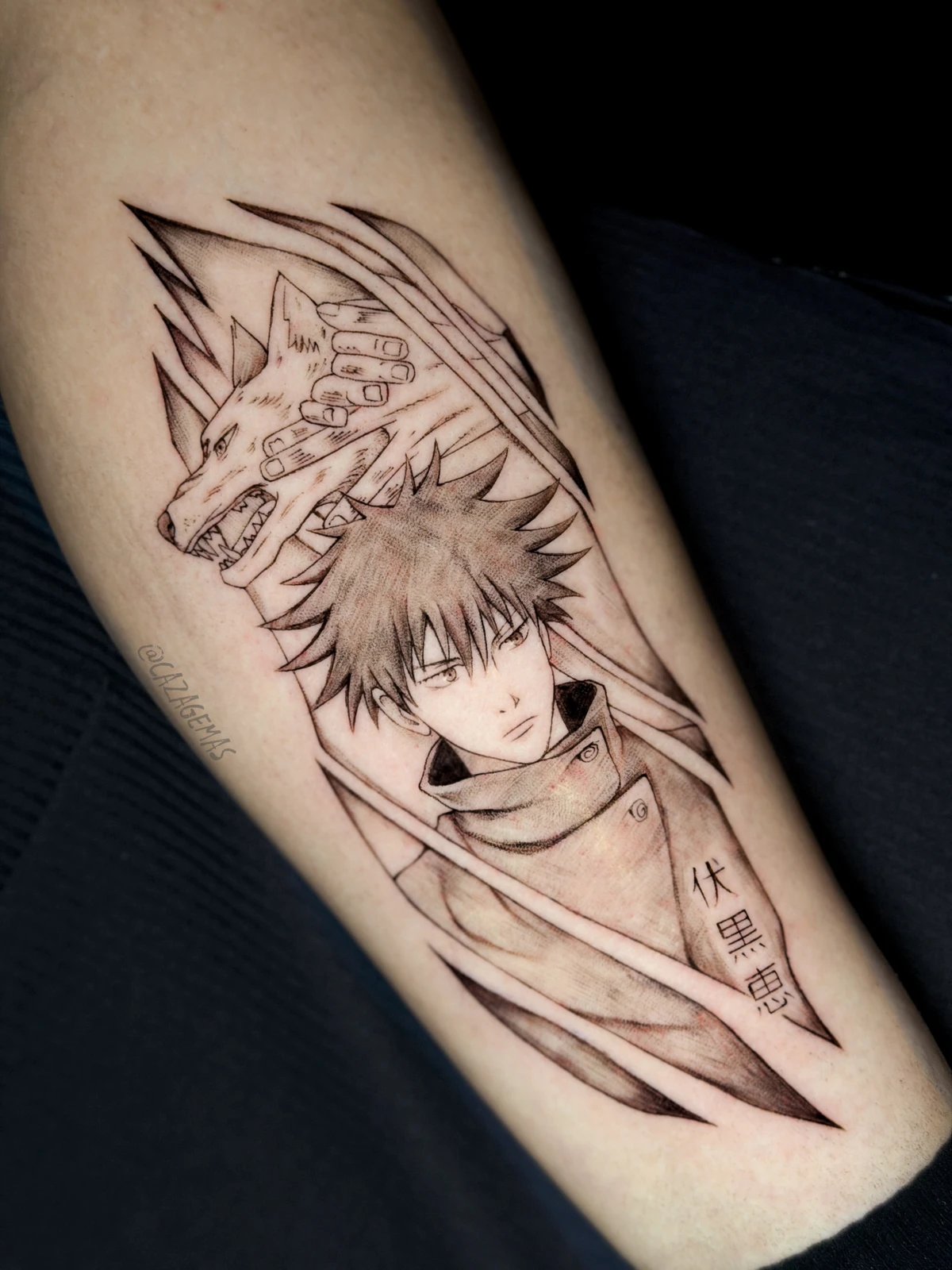 Tattoo of an anime character next to a wolf with dynamic strokes